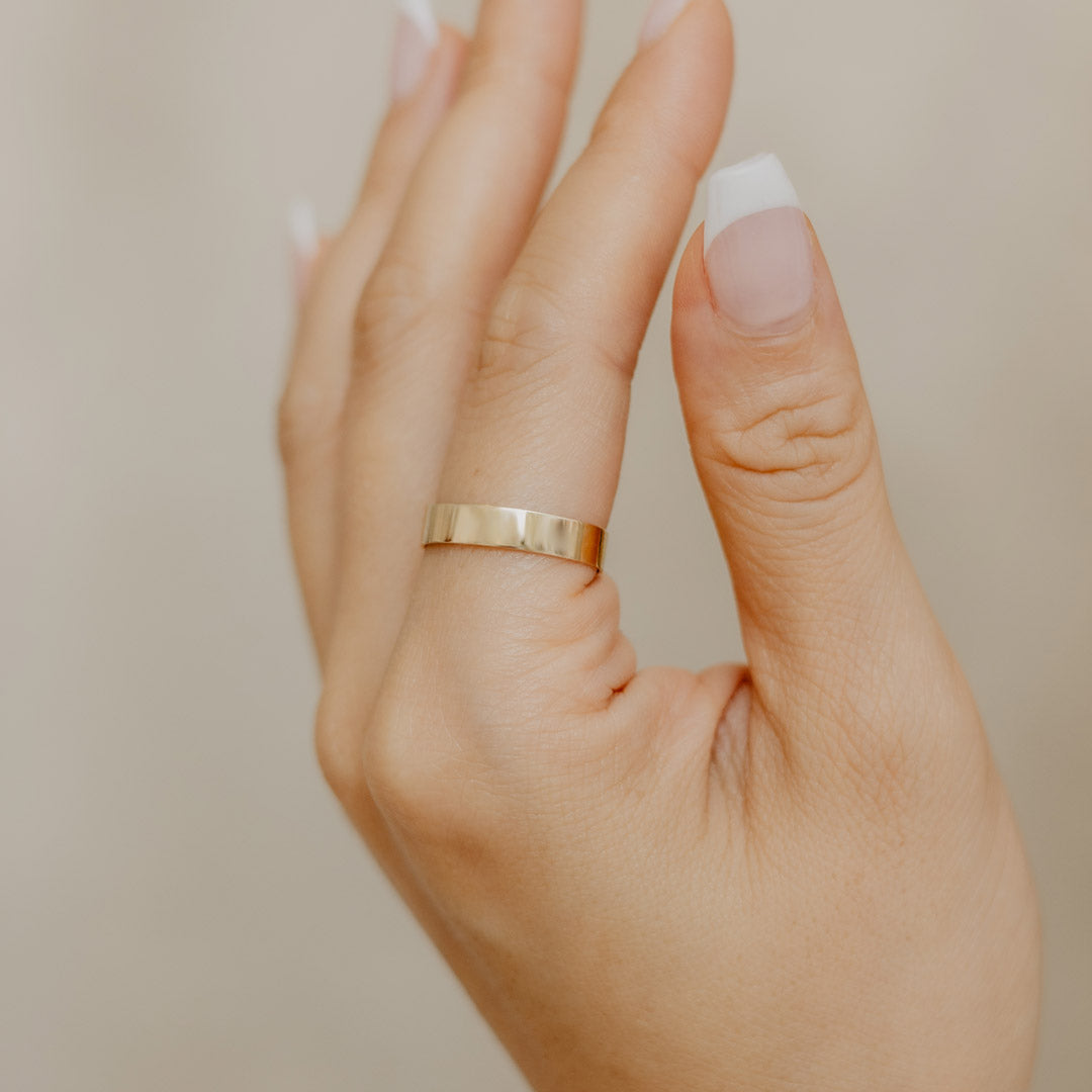 Flat gold deals band ring