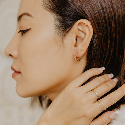 Solid Gold Wave Blue CZ Hoops