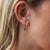 Boucles d'oreilles créoles CZ noires en pointillés en or 14 carats