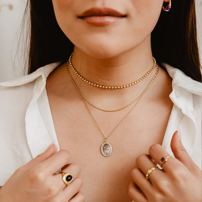 Collier en nacre noire Aurora dorée