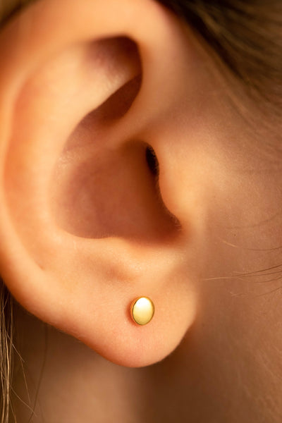 Boucles d'oreilles à disque unique