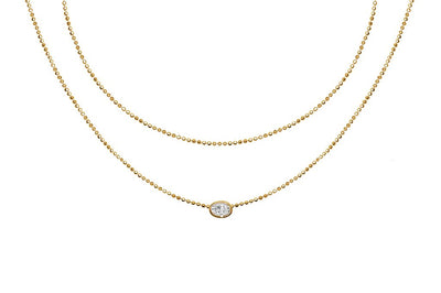 style superposé collier en or jaune 18 carats pendentif unique zircone cubique or vermeil collection kemmi