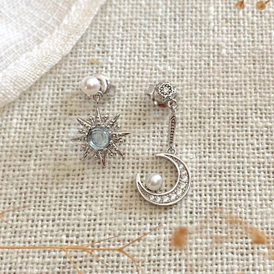 boucles d'oreilles goutte étoile de lune style asymétrique fait à la main en argent sterling topaze bleue pierre perle zircone cubique pierres boho chic bijoux raffinés collection kemmi